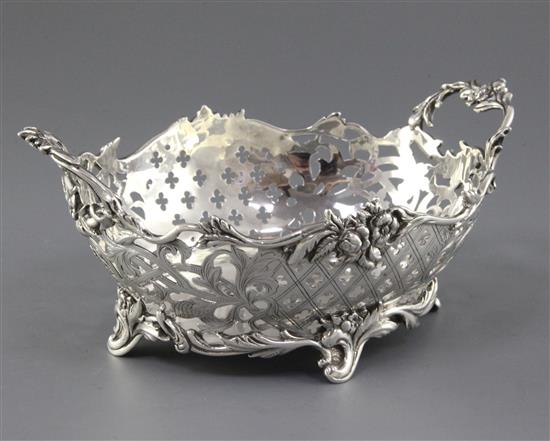 An antique Dutch? pierced silver two handled dish, 15 oz.